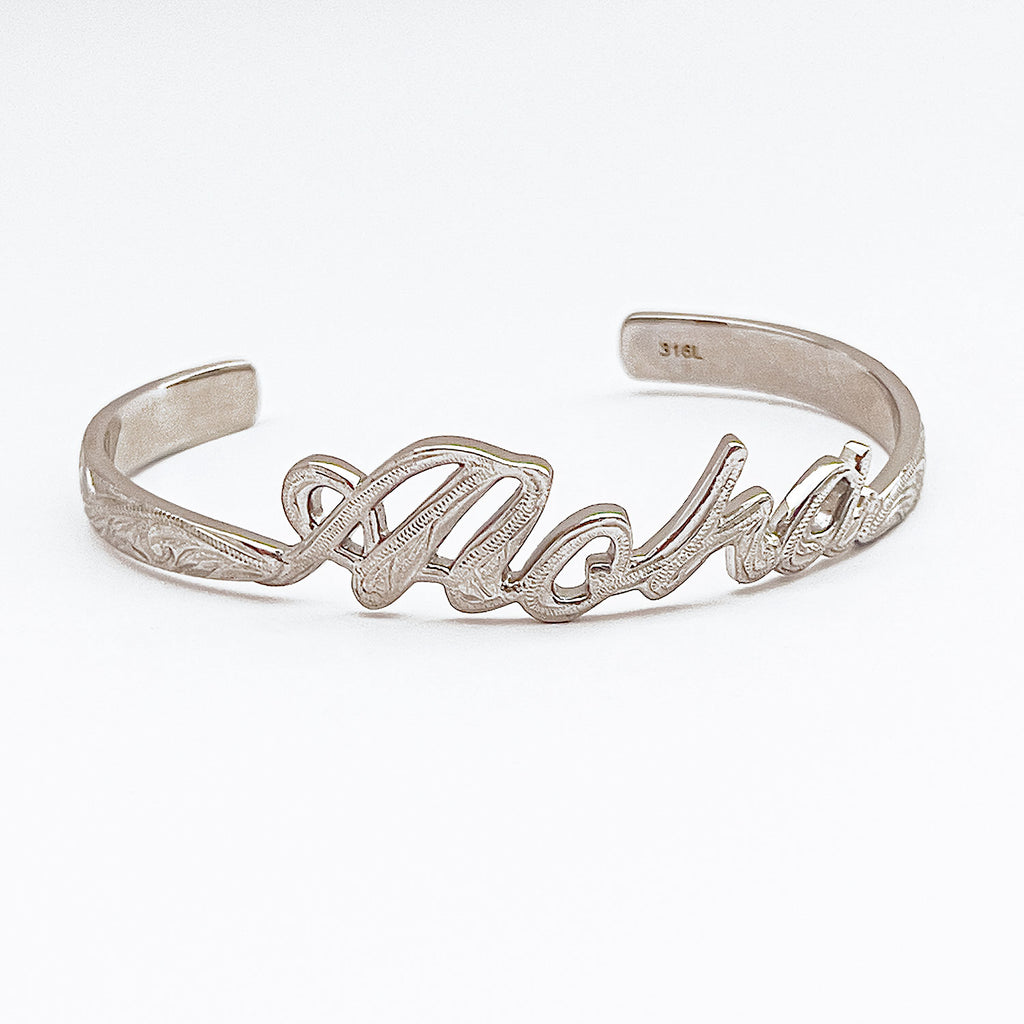 stainless steel  bangle (silver color), cuff style bracelet carved script Aloha with engraved design motif