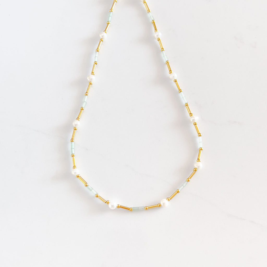 18k gold-plated beaded necklace, with spaced out freshwater pearl and aventurine accents.