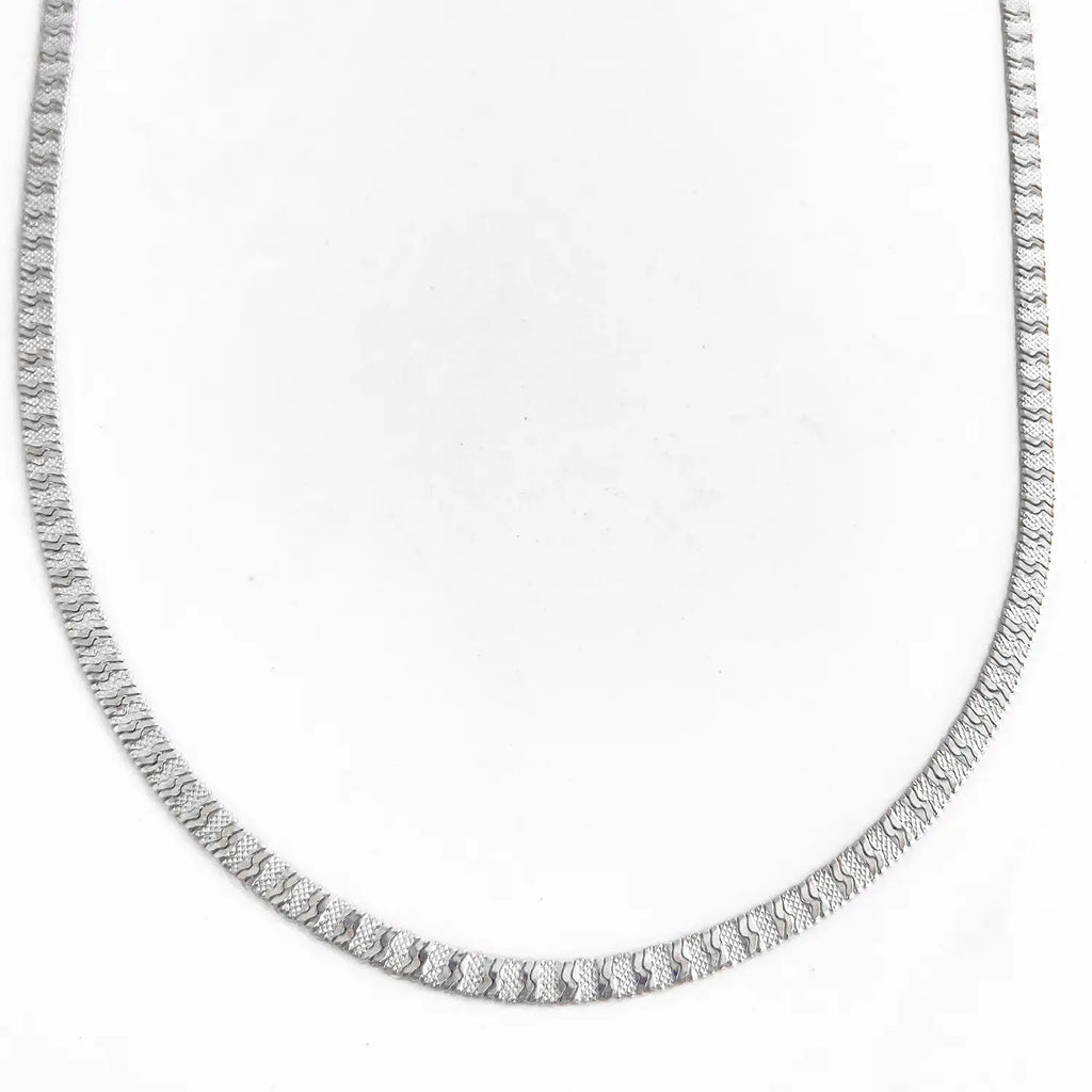 Silver color stainless steel snake textured chain necklace.