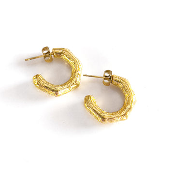 18k gold plate 'driftwood' textured hoop earrings. Hoop ends 3/4 way back up to top.