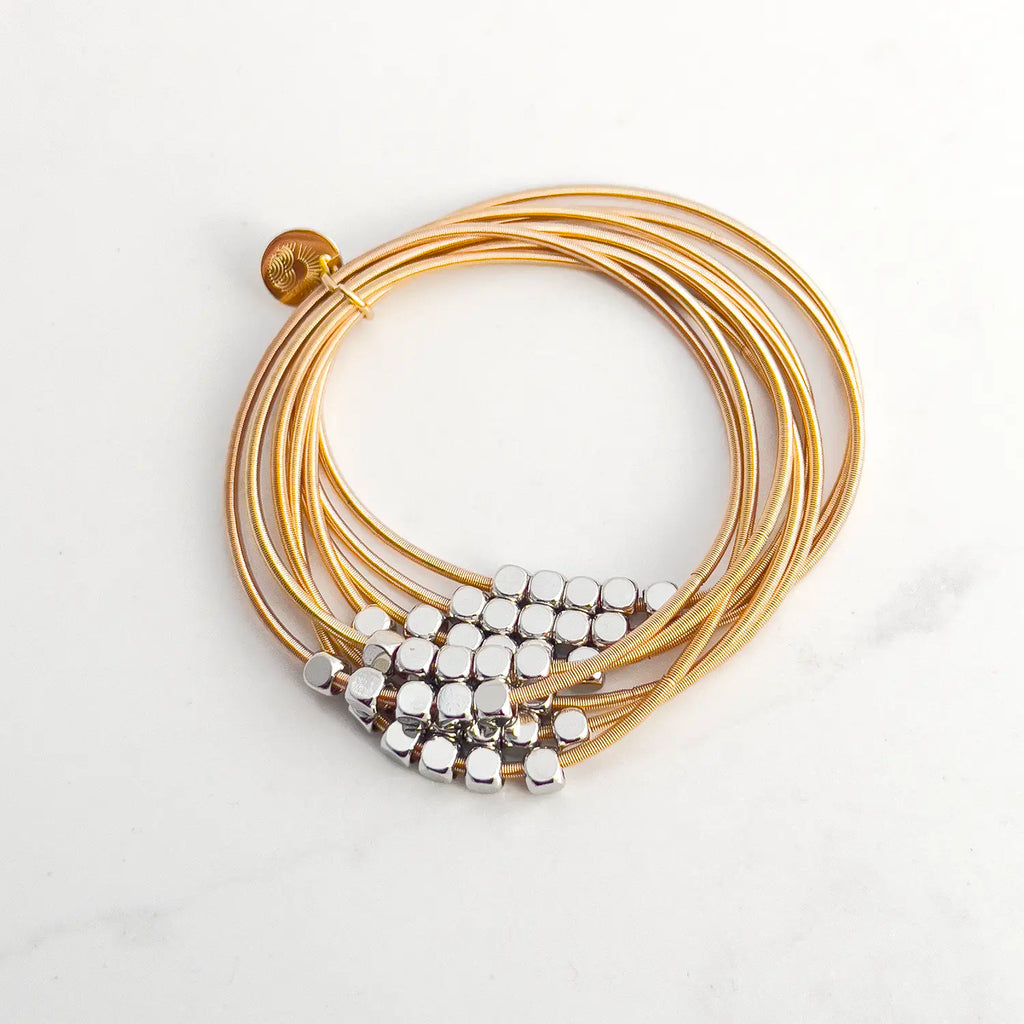 Stainless steel gold-plated stacked 8-wire guitar string bracelet with colored loose beads (silver)