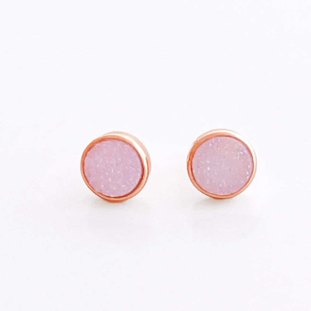 Druzy rose quartz stone stud earrings with 24k rose gold plated rims. 
