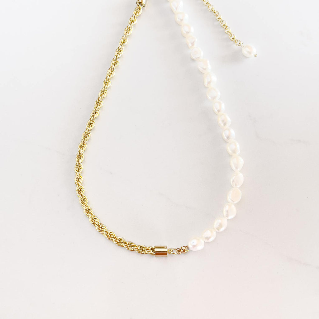 Mixed media half and half pearl and chain necklace. Half 18k gold textured thick chain, other half white fresh-water pearl.