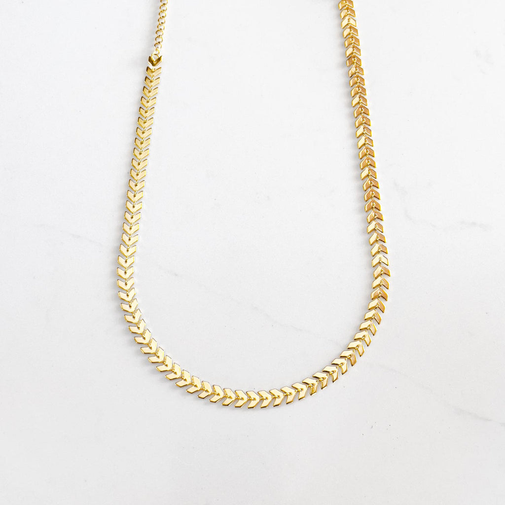 Gold plated stainless steel necklace. Flat fishbone style chain.