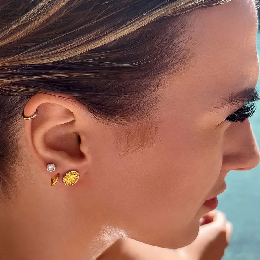 14k gold plated stud earrings engraved with island flower.