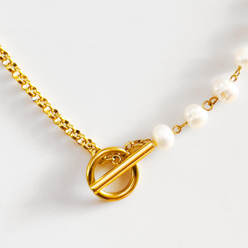 18k gold plated half and half rope chain necklace. Toggle clasp with half 18k gold plated chain and half freshwater pearl chain.